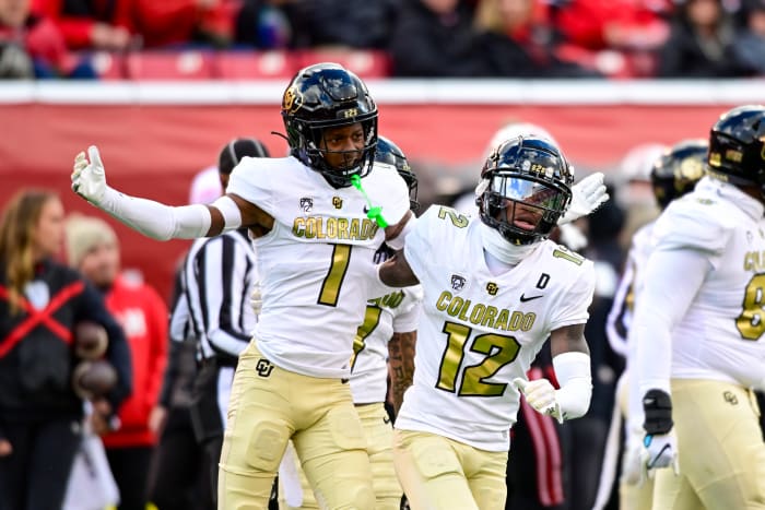 Nov 25, 2023; Salt Lake City, Utah, USA; Colorado Buffaloes athlete Travis Hunter (12) and cornerback Cormani McClain (1) react after a call against the Utah Utes at Rice-Eccles Stadium